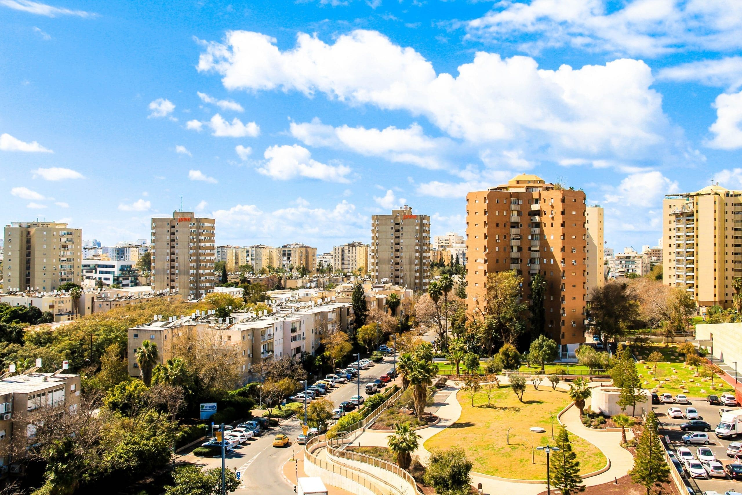 Clouds  over Tel Aviv skyline at Sunny Day
